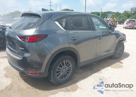 2021 Mazda Cx-5 Touring z USA, uszkodzony, nr VIN JM3KFACM9M0461562